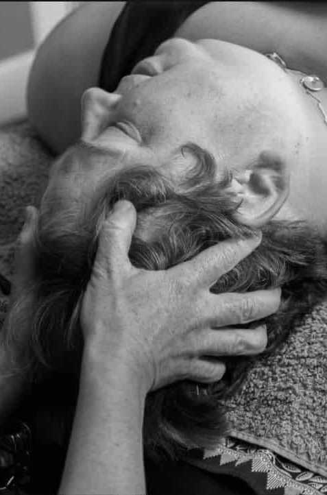 photography of a head being massaged