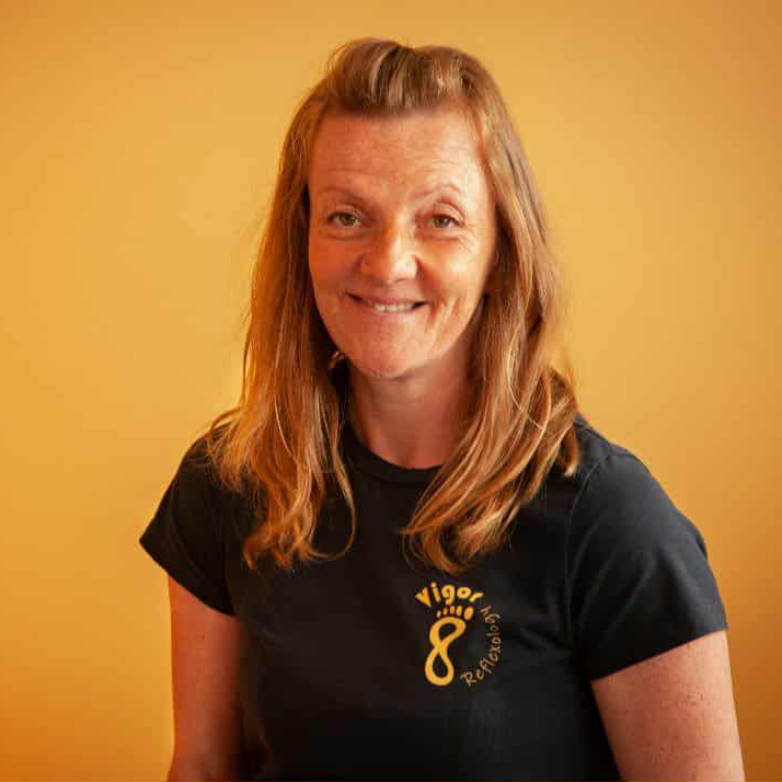 portrait of beth wearing a vigor8 tee shirt